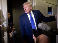 U.S. President Donald Trump speaks to members of the media aboard Air Force One while flying from Palm Beach International Airport on February 16, 2026 enroute to Washington, DC.