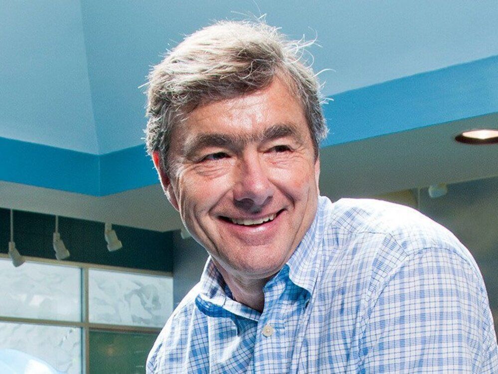 John Risley in a white and blue flannel shirt