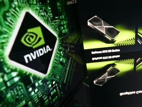 This illustration photograph shows screens displaying a portrait of the president of U.S. chipmaker Nvidia Jensen Huang and the logo of the company in Toulouse, southwestern France on Feb. 18, 2026.