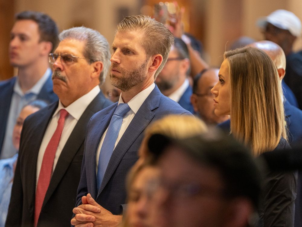 Eric Trump stands looks on as his father, Former President Donald Trump speaks during a press conference at Trump Tower on May 31, 2024 in New York City.