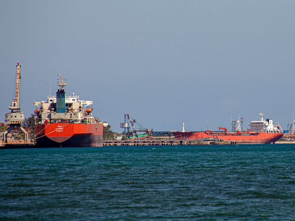 The Nicos I.V. oil tanker (R), sailing under the flag of Saint Vincent and the Grenadines, is seen alongside other tanker vessels in the port of Matanzas, Cuba, on February 17, 2026.