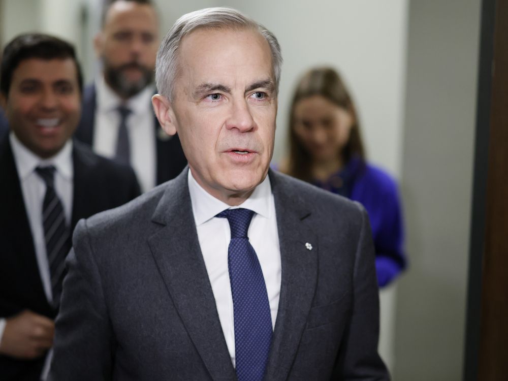 Prime Minister Mark Carney leaves a Liberal caucus meeting on Parliament Hill, February 25, 2026.