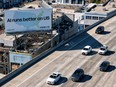 In an aerial view, a billboard advertising an artificial intelligence (AI) company is posted on September 16, 2025 in San Francisco, California