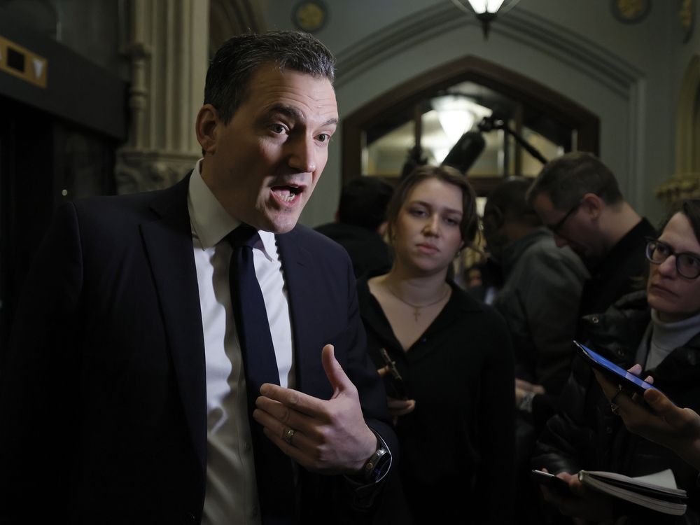 Canada's Minister of Artificial Intelligence and Digital Innovation Evan Solomon speaks to journalists before a Cabinet meeting on Parliament Hill February 24, 2026.