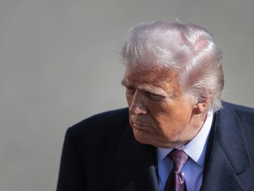 President Donald Trump stops to speak to the media as he departs on Marine One on the South Lawn of the White House on February 27, 2026 in Washington, DC.