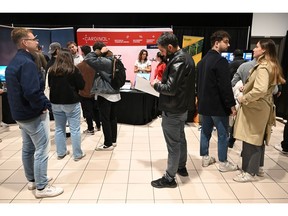 Jobseekers at career fair in Montreal.