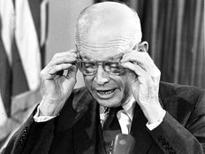 U.S. President Dwight Eisenhower reads from his notes during his farewell address to the nation on Jan. 17, 1961, in which he delivered a post-war warning to his people.