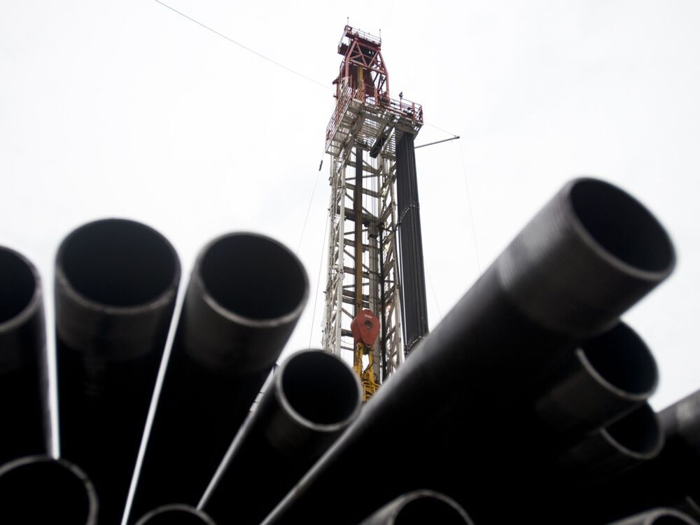 Threaded drilling pipes are stacked at a hydraulic fracturing site owned by EQT Corp. located atop the Marcellus shale rock formation in Washington Township, Pennsylvania, U.S., on Oct. 31, 2013.
