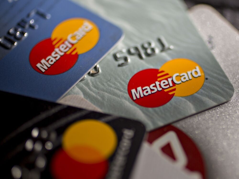 Mastercard Inc. credit and debit cards are arranged for a photograph in Arlington, Virginia, U.S. on Monday, April 29, 2019.