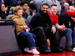 Rapper Drake is seen courtside during first half a game between the Toronto Raptors and the Golden State Warriors at Scotiabank Arena on January 13, 2025 in Toronto, Canada.
