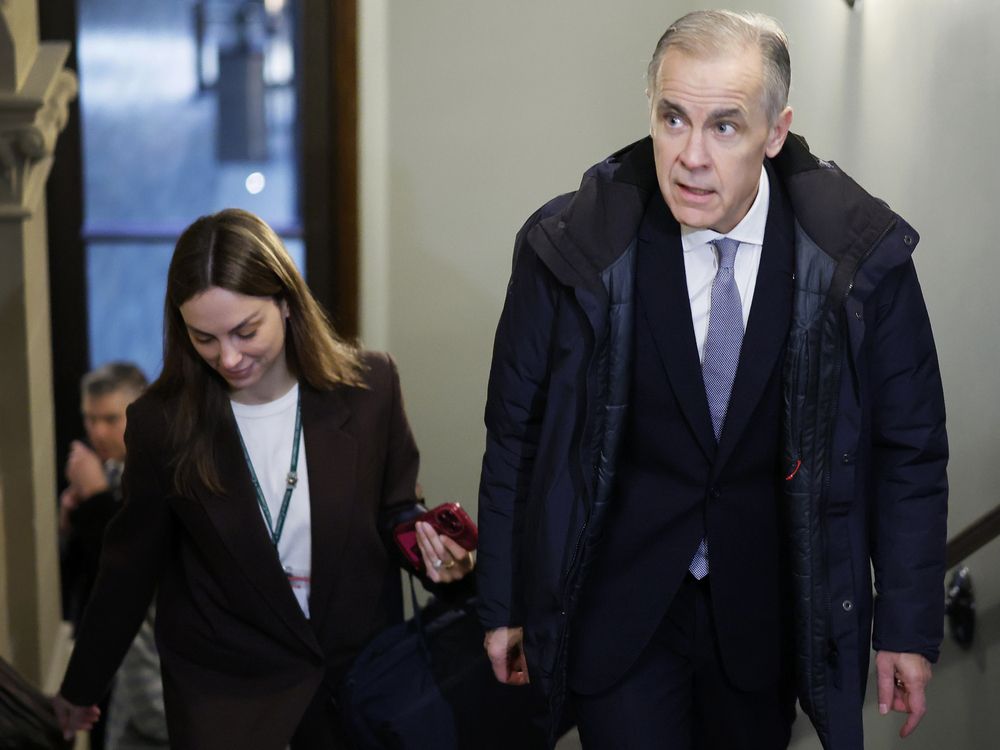 Prime Minister Mark Carney arrives to Parliament Hill for a cabinet meeting in Ottawa March 12, 2026.