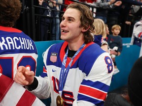 Gold medalist Jack Hughes #86 of Team United States celebrates following the Men's Gold Medal match between Canada and the United States on day 16 of the Milano Cortina 2026 Winter Olympic games at Milano Santagiulia Ice Hockey Arena on February 22, 2026 in Milan, Italy.
