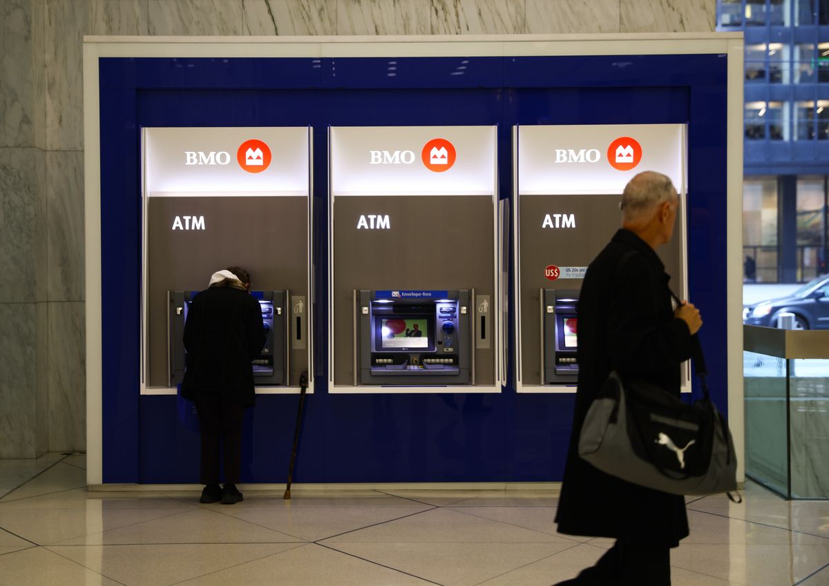 Bank of Montreal ATMs in the financial district of Toronto, Ontario, Canada, on Wednesday, Oct. 29, 2025.