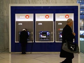 Bank of Montreal ATMs in the financial district of Toronto, Ontario, Canada, on Wednesday, Oct. 29, 2025.