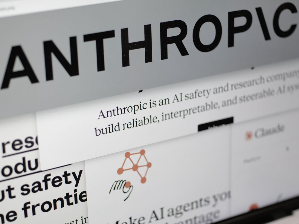 Pages from the Anthropic website and the company's logo are displayed on a computer screen in New York on Feb. 26, 2026.