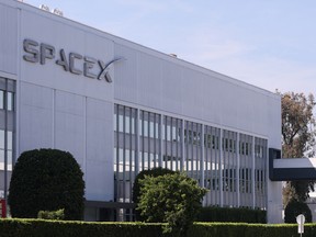 SpaceX signage displayed outside a Space Exploration Technologies Corp. facility in Hawthorne, California on March 26, 2026.