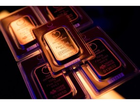 A selection of 100 gram gold bars at Conclude Zrt bullion dealer arranged in Budapest, Hungary, on Thursday, Jan. 22, 2026. Gold closed in on $5,000 an ounce, with geopolitical risks and renewed threats to the Federal Reserve's independence supporting a record-breaking rally.