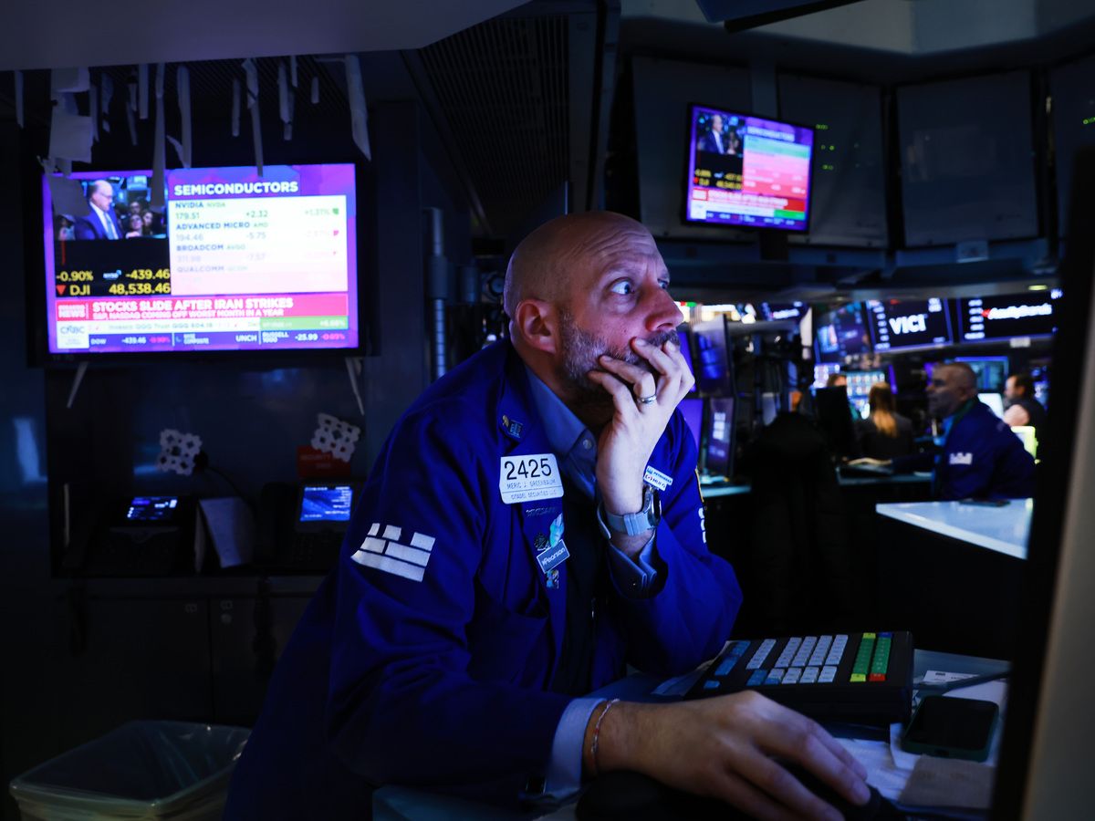 Traders work on the floor of the New York Stock Exchange on March 2 in New York City.