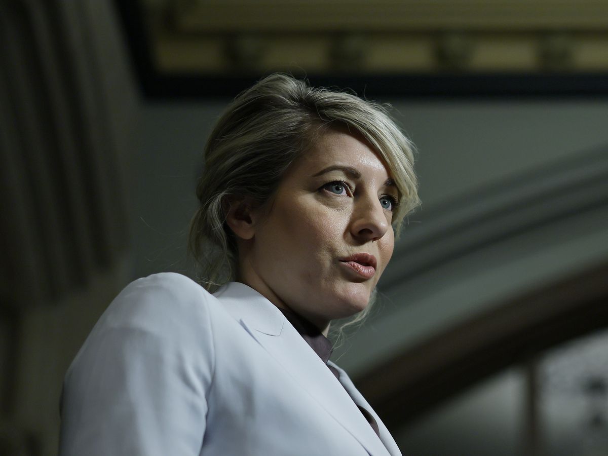 Minister of Industry Mélanie Joly speaks to media before a Liberal caucus meeting on Parliament Hill in Ottawa March 11, 2026.