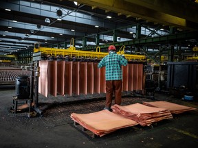 A worker monitors the electrochemical process of extracting pure copper at a smelter in Glogow in southwestern Poland, owned by KGHM the metallurgical giant in the country, on March 24, 2026.