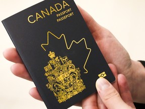 The new Canadian passport is unveiled at an event at the Ottawa International Airport in Ottawa on May 10, 2023.