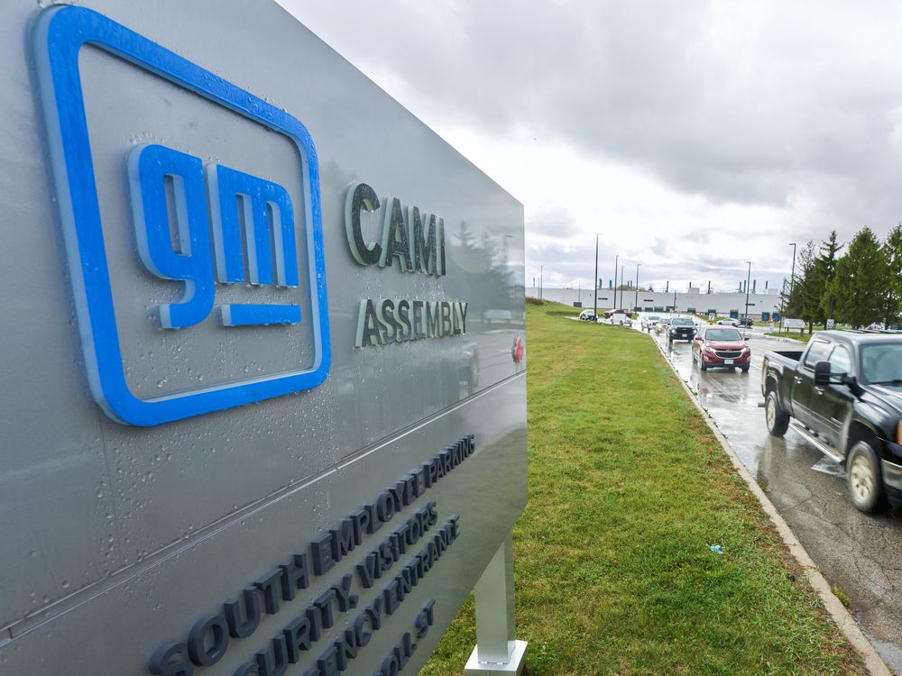 Cars exit the General Motors' CAMI auto assembly plant in Ingersoll, Ontario, on October 24, 2025, a few days after the company announced it will stop producing the BrightDrop electric delivery van that is only made at this facility.