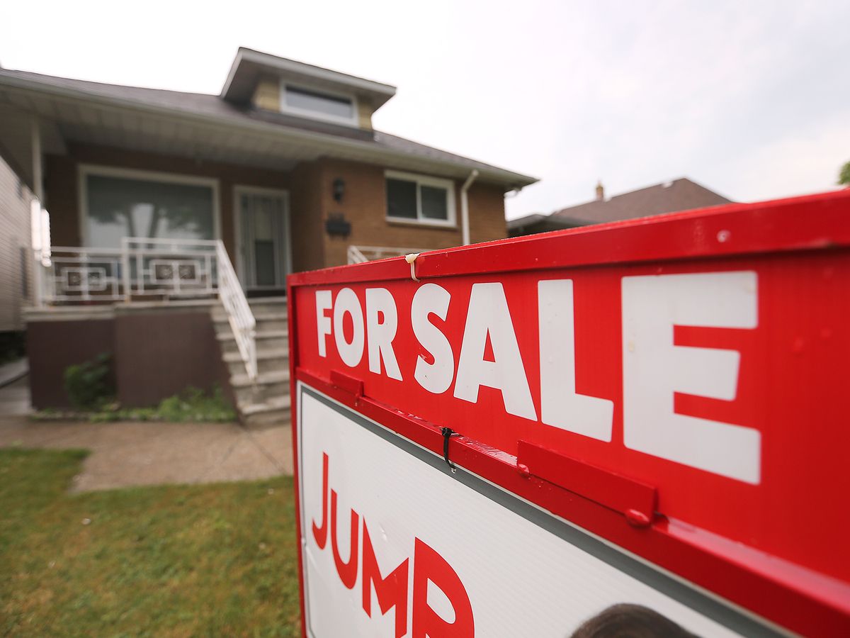 A for sale sign is shown on a house on Howard Avenue in Windsor on Wednesday, July 9, 2025. 
