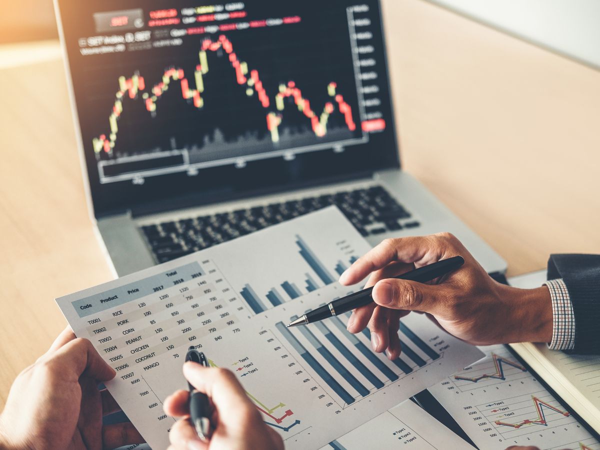 Business Team Investment Entrepreneur Trading discussing and analysis graph stock market trading,stock chart concept getty
