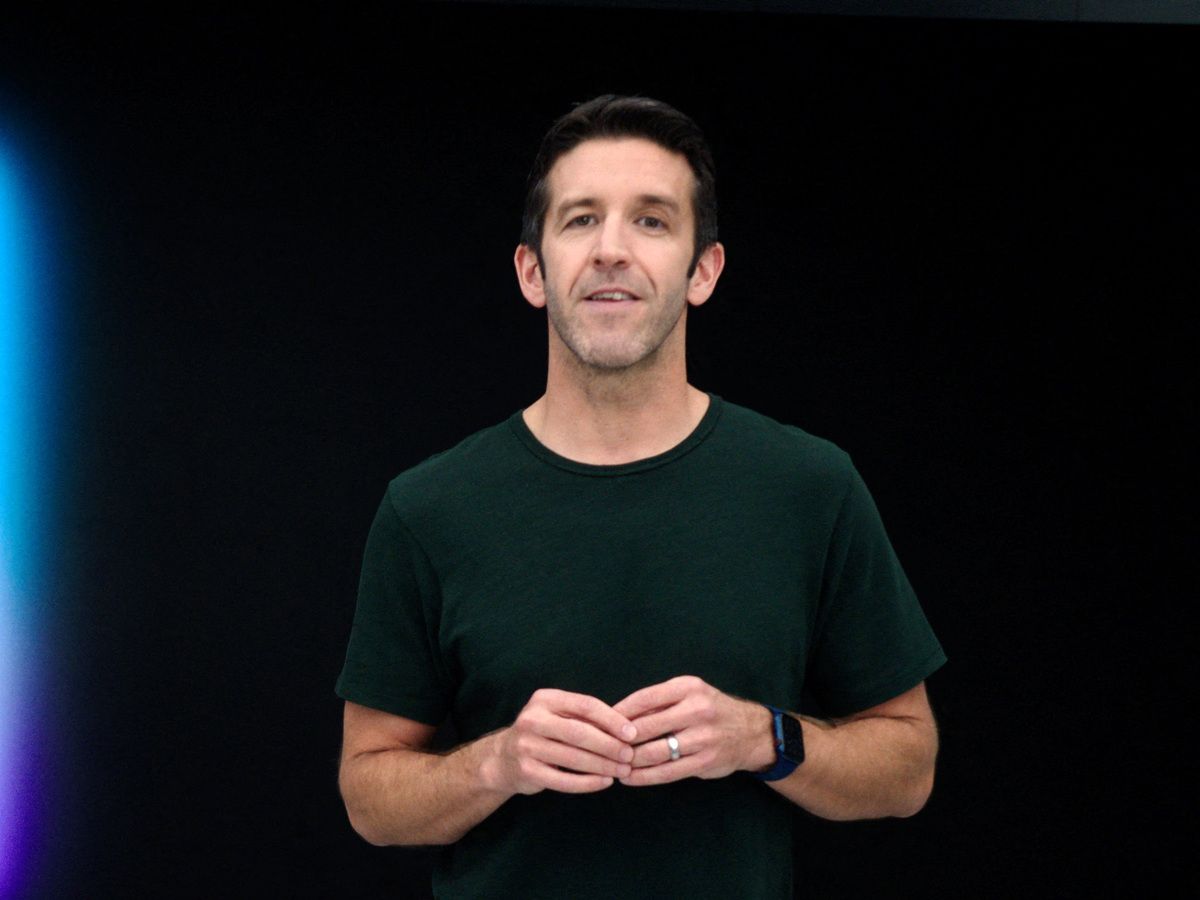 This handout released and taken on November 10, 2020 by Apple inc. shows Apple's vice president of Hardware Engineering John Ternus unveiling M1, the first chip designed specifically for the Mac during a special event at Apple Park in Cupertino, California.