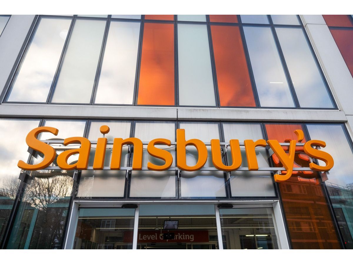 A sign above the entrance to a Sainsbury's supermarket in London.