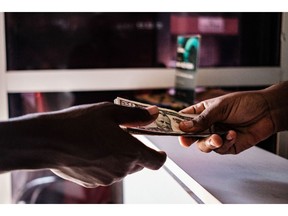 Victor Adewale/Bloomberg