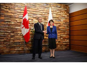 Mark Carney, Canada's prime minister, left, and Sanae Takaichi, Japan's prime minister, during a meeting in Tokyo, Japan, on Friday, March 6, 2026.