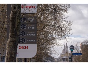 Fuel price signs at a Total gas station in Paris, France, on Thursday, March 12, 2026. TotalEnergies raised its diesel price cap by 10 euro cents ($0.12) at French service stations as the Middle East conflict squeezes supplies and drives oil prices higher.