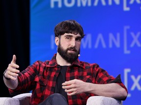 Cohere CEO Aidan Gomez speaks at the recent HumanX Conference in San Francisco. Cohere announced Friday that it was merging with Aleph Alpha.