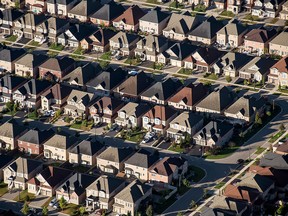 Homes stand in a Toronto neighbourhood. Low housing elasticity is preventing the Canada's most productive cities from scaling up.