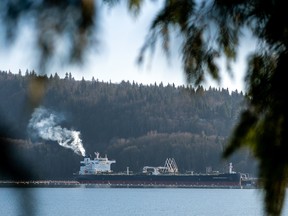 An oil tanker is loaded at the Westridge Marine Terminal at the end point of the Trans Mountain Pipeline System in Burnaby, B.C.