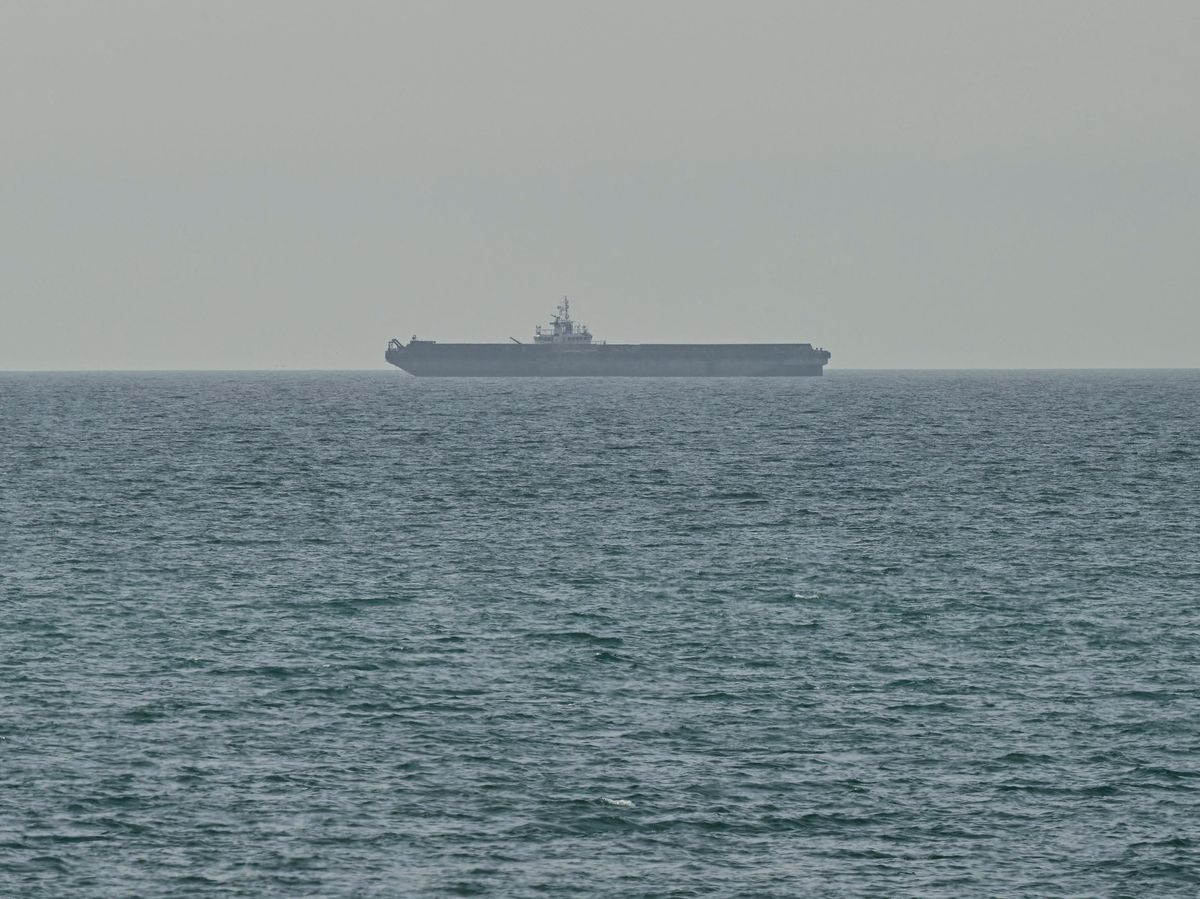 A ship is seen off the coast of Ras al-Khaimah, the day after the failure of U.S.-Iran peace talks on April 13.