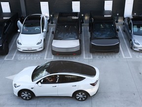 Tesla Inc. electric vehicles, including the Cybertruck, charge at stations in Los Angeles, California.