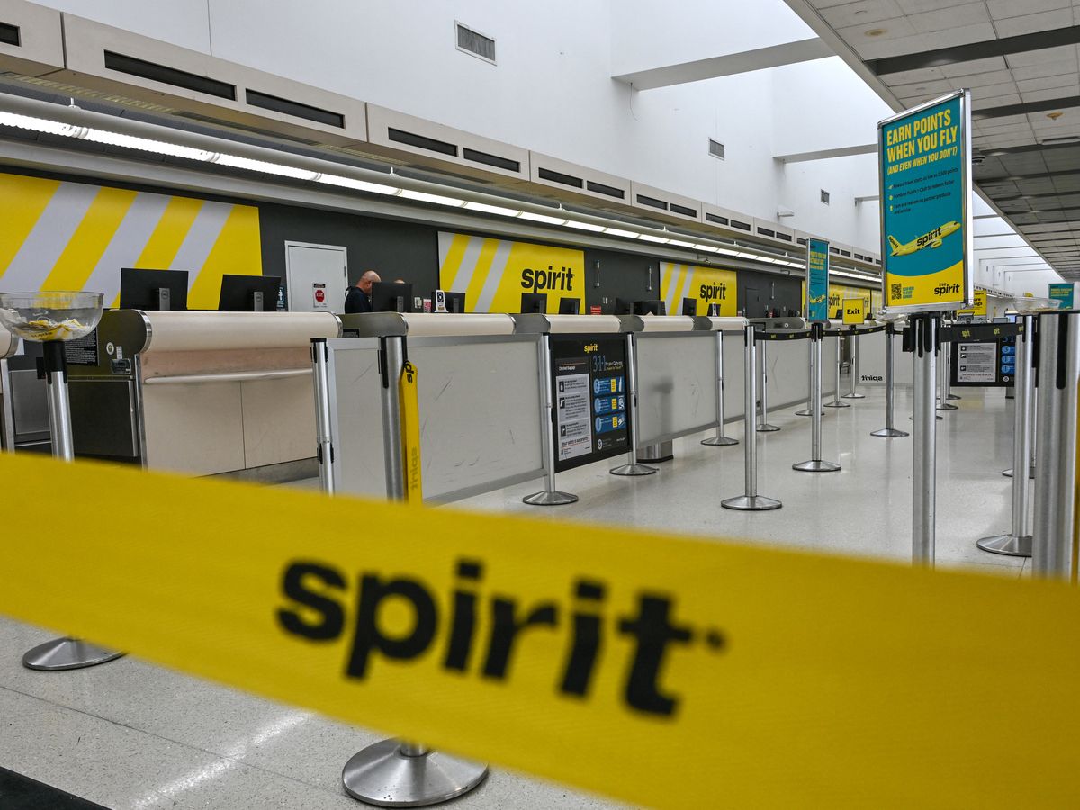 The flights check-in area of Spirit Airlines is empty after the company ceased global operations at Fort Lauderdale-Hollywood International Airport in Fort Lauderdale, Florida, on May 2, 2026.
