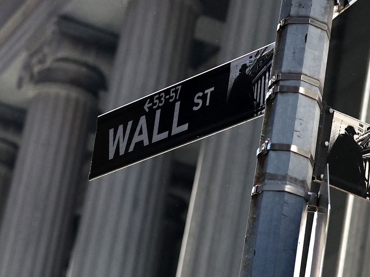 A street sign for Wall Street in the Financial District near the New York Stock Exchange (NYSE) on May 19, 2025, in New York