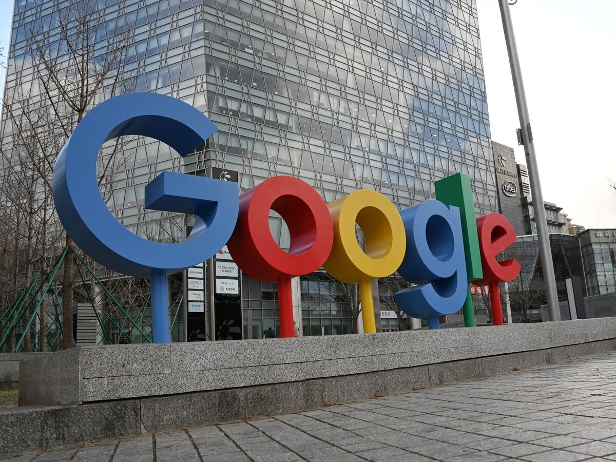 The Google logo is seen outside a building housing Google offices in Beijing on February 4, 2025.