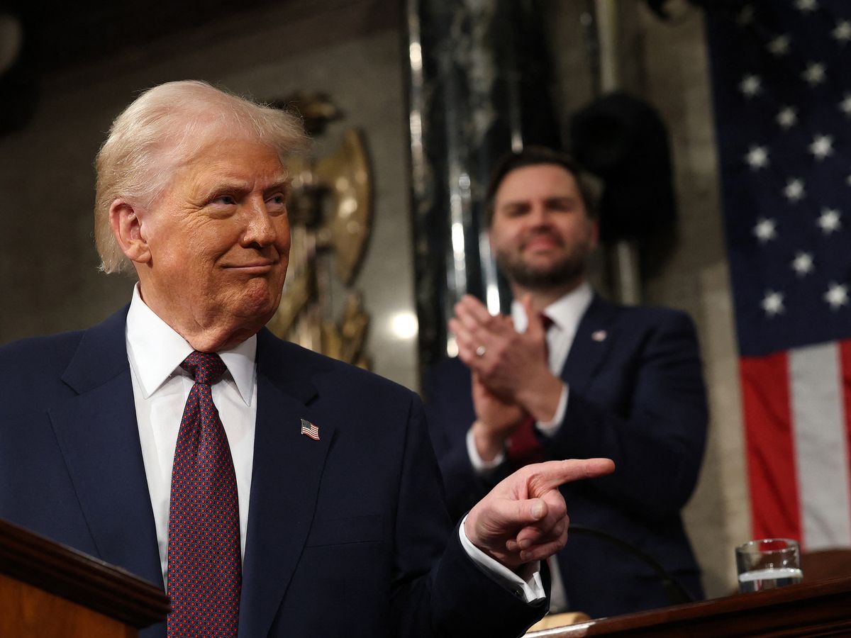 US Vice President JD Vance and Speaker of the House Mike Johnson (R-LA) applaud as US President Donald Trump speaks during an address to a joint session of Congress in the House Chamber of the US Capitol in Washington, DC, on March 4, 2025.