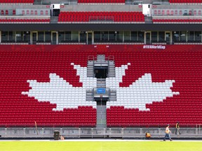 Workers prepare Toronto Stadium (temporarily renamed from BMO Field for the 2026 FIFA World Cup) in Toronto, Canada, on May 19, 2026.