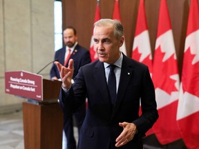 Canadian Prime Minister Mark Carney departs after speaking during a news conference on Parliament Hill in Ottawa, Canada, on May 14, 2026.