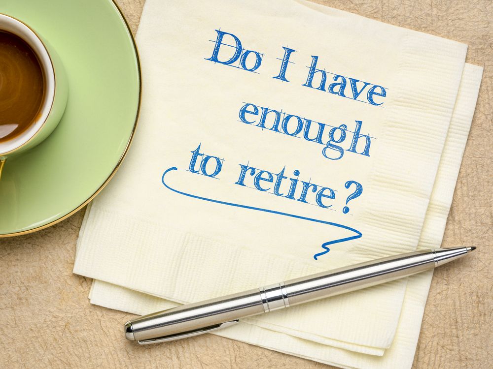 Do I have enough to retire? Handwriting on a napkin with a cup of coffee.
