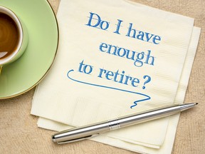 Do I have enough to retire? Handwriting on a napkin with a cup of coffee.