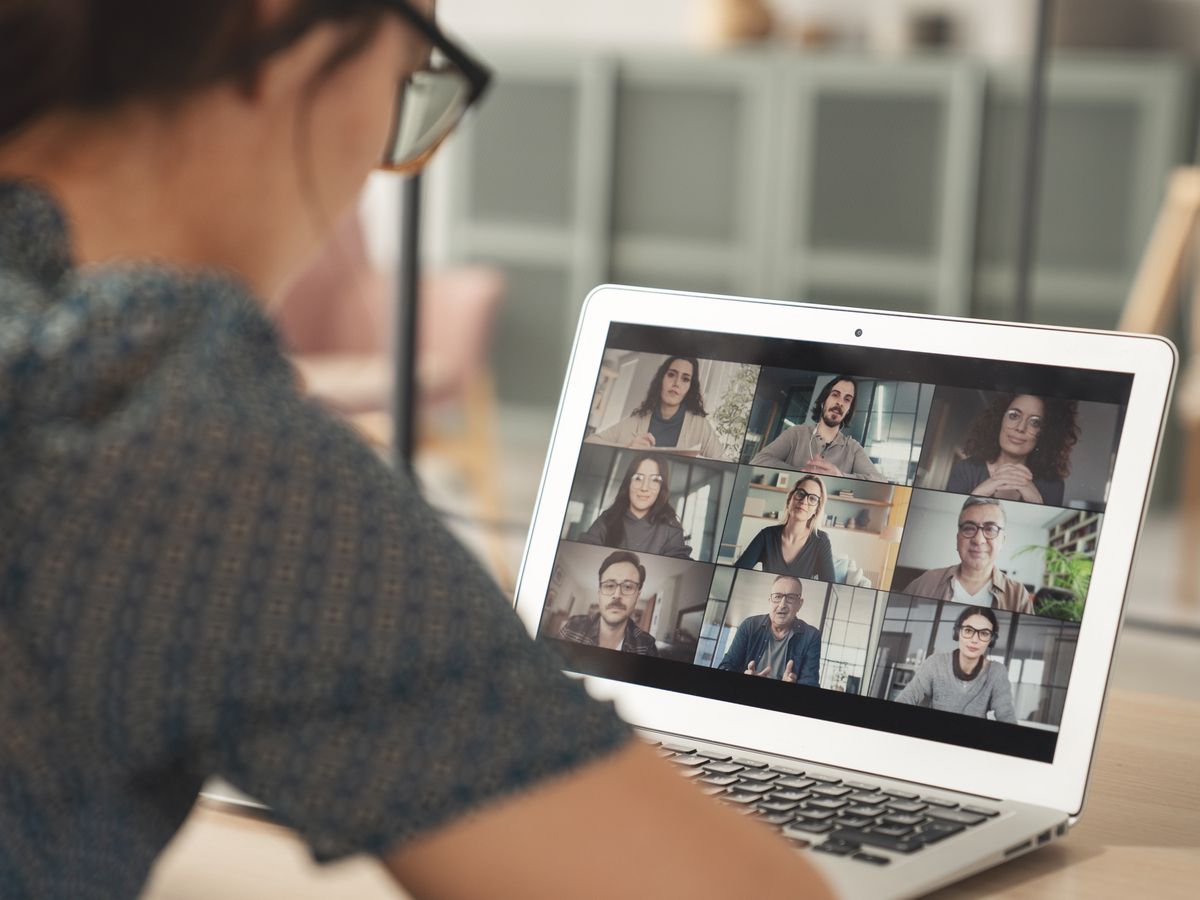 Young woman using computer for video call
