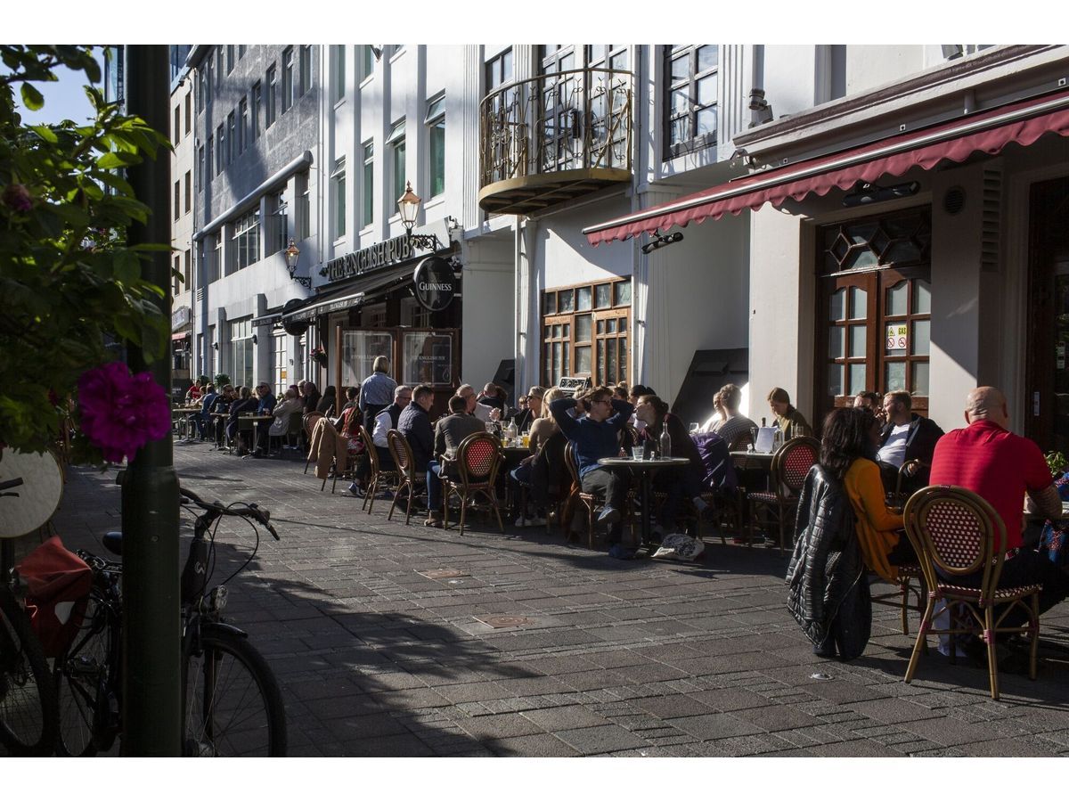 Customers outside restaurants and cafes in Reykjavik.