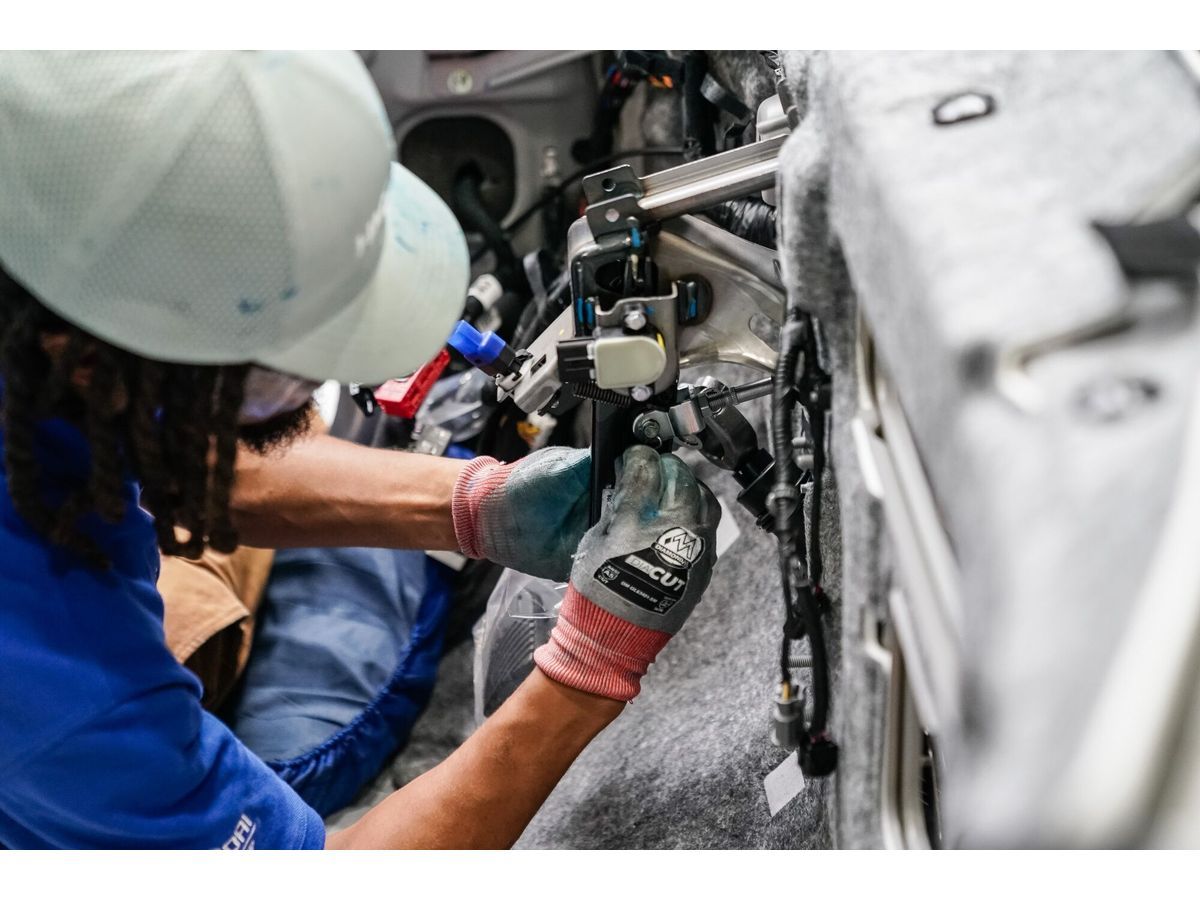 A worker assembles a vehicle on the production floor at the Hyundai Metaplant electric vehicle manufacturing facility in Ellabell, Georgia, US, on Wednesday, June 11, 2025. The historic city of Savannah, known for gardens and gothic mystery, is leaving no stone unturned as it helps South Korean auto giant Hyundai staff up a futuristic new factory.