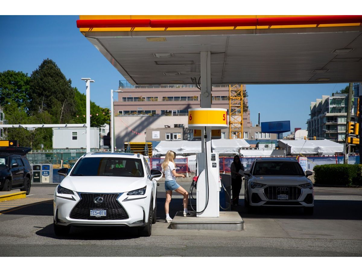 A driver refuels at a Shell gas station in Vancouver on May 4.